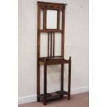 Early 20th century oak hallstand, bevelled mirror back, hinged compartment to front,