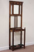 Early 20th century oak hallstand, bevelled mirror back, hinged compartment to front,