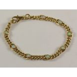 Gold opal set curb chain bracelet hallmarked 9ct Condition Report <a