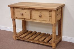 Waxed pine two drawer kitchen dresser raised on potboard base, W119cm, H90cm,