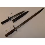 Remington 1913 patter bayonet 55cm and a British WWII L1A4 bayonet with black painted metal