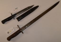 Remington 1913 patter bayonet 55cm and a British WWII L1A4 bayonet with black painted metal