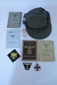 German Third Reich militaria including cap, cloth badges,