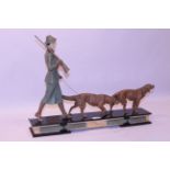Art Deco period continental cold painted spelter group of a Lady shooter,