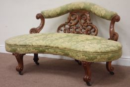 Victorian walnut framed kidney shaped settee, fret work and carved back supports,