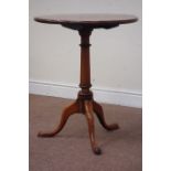 Early Georgian circular yew wood tilt top wine table, raised on turned elm column tripod base,