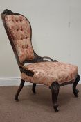 Quality Victorian rosewood nursing chair, spoon back, carved with berries and foliage,