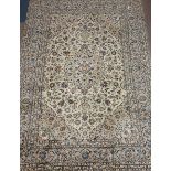 Persian Kashan rug, cream ground, overall floral design, large central medallion,