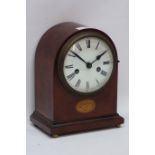 Edwardian mahogany mantle clock, white enamelled dial with Roman numerals on brass bun feet,