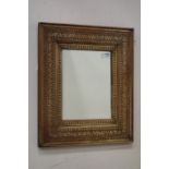 20th century Eastern Hardwood and brass inlaid mirror,