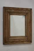 20th century Eastern Hardwood and brass inlaid mirror,