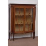 Edwardian inlaid mahogany display cabinet enclosed by two astragal glazed doors, satin wood banding,