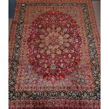 Persian Meshed rug, plum red ground, all over floral design, boteh motif to guards,