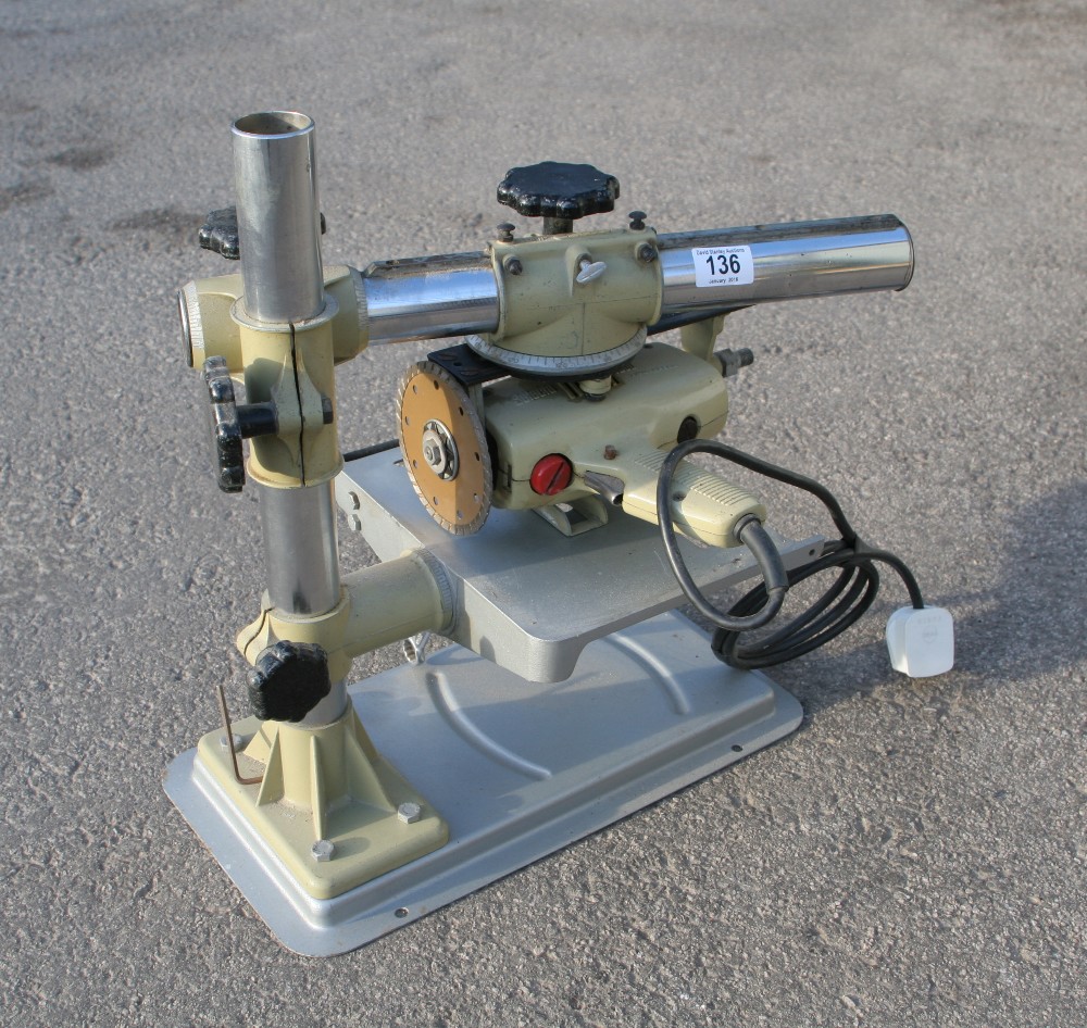 A SELECTA drill stand with drill