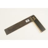 An ebony and brass square by BUCK,