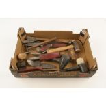 A quantity of hammers and panel tools