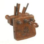 A small European coopers fruitwood chiv with triple screw stems with foliate decoration and J.W.