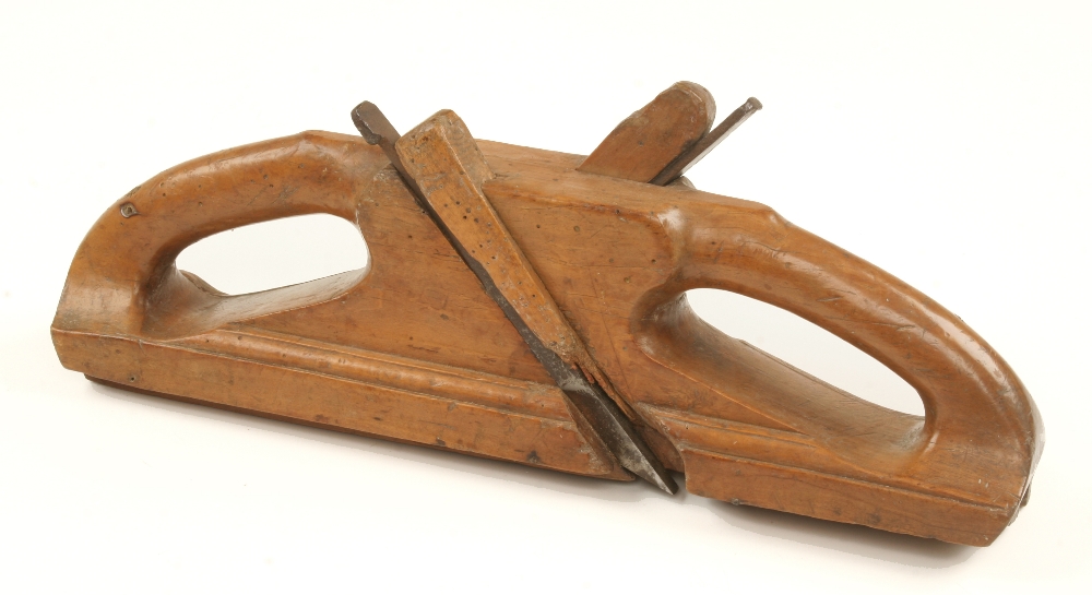 An early French fruitwood T & G plane 15" x 3" with integral handles (illustrated Russell fig 401)