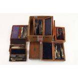 Seven part sets of drawing instruments in orig mahogany boxes