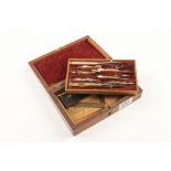A continental brass and ivory drawing set C1890 with rules under tray in mahogany case G