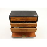 An engineers three drawer chest with some tools,