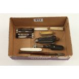 A collection of eight items including three pairs of ivory scaled folding scissors,