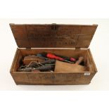 A wood box of tools
