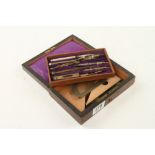 A brass drawing set in rosewood box G
