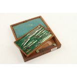 A set of German Silver drawing instruments in rosewood case incomplete G