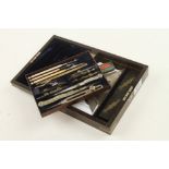 A set of German Silver drawing instruments in rosewood case,