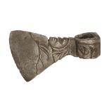 An unusual figural axe head apparently found in France profiled as a caricature of a master cooper