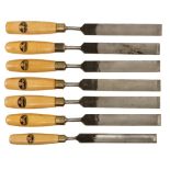 Seven unused long cranked paring gouges by MARPLES 1" to 1 1/4" mostly different with orig decal on