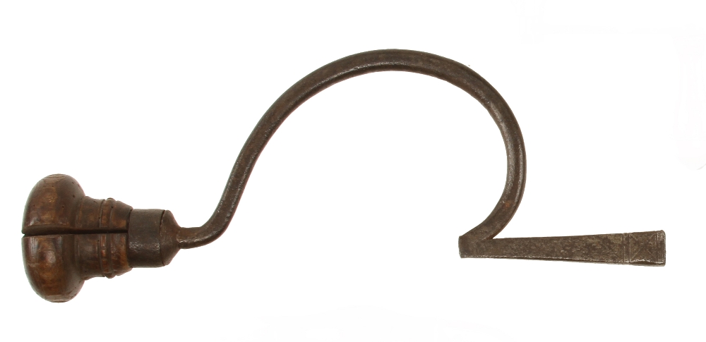 A 17/18c iron brace with simple decoration to pad,