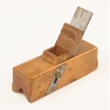 A small boxwood sliding box type chamfer plane 6" x 2" with replaced iron and wedge (illustrated