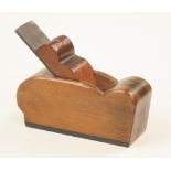 An unusual decorative bullnose plane 5" x 1 5/8" made from beech rosewood and ebony with mahogany