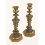 A pair of 8 1/2" very fine quality 19c brass candlesticks with beautifully decorated conical stems