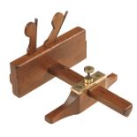 An unusual 6" x 1/16" iron grooving plane with brass fittings,