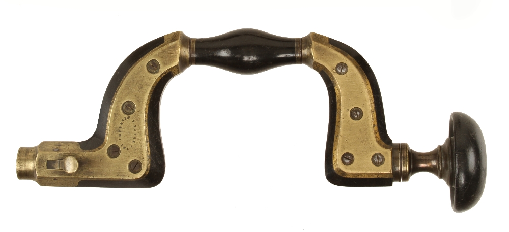 A brass framed ebony brace by FENTON & MARSDEN with 986 disc in ebony head (illustrated Russell fig