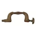 An earliest model Ultimatum brass framed rosewood brace by Wm MARPLES, the brass head with horn pad,
