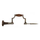 A fine 18c French coopers brace with simple moulded decoration to frame and fruitwood handle and