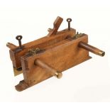 A large Dutch beech plough plane with brass skate with makers mark J*N with Crown over J