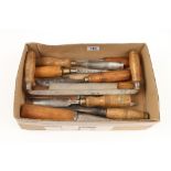 Eight heavy chisels and gouges and a drawknife