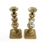 An early pair of 10" brass candlesticks G++