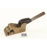 A 1" brass bullnose plane with ebony wedge holding iron by HOWARTH G+