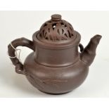 A Chinese Yixing pottery teapot and cover, seal mark to base, height 13cm.