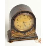 A Mappin and Webb clock with a French movement in an arched black lacquer chinoiserie case,