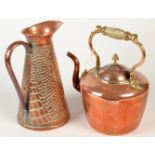 A Victorian copper kettle and a copper jug.