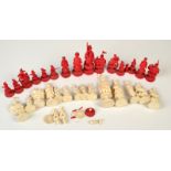 A 19th century Chinese export Canton ivory figural chess set, circa 1820, one side stained red,