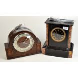 A Victorian mantle clock with a French movement in a slate marble case,