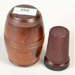 A treen barrel shape box and a bakelite 'Ship's Lifeboat Matches' jar.